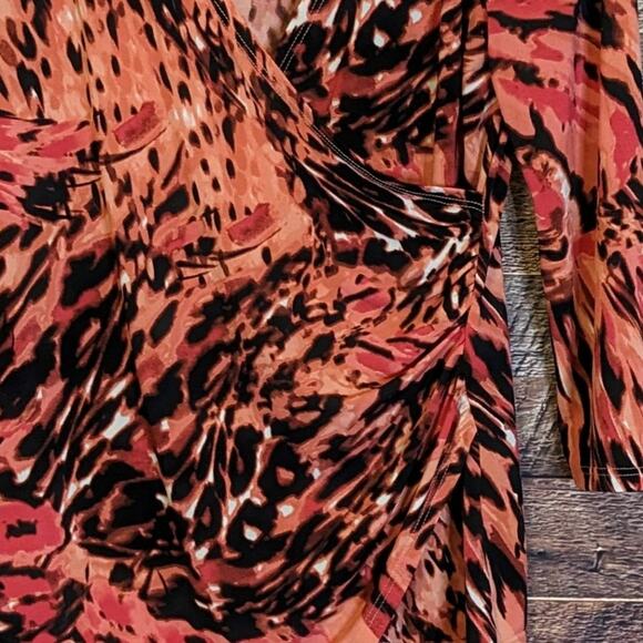 Jennifer Lopez small orange and black animal print top. fall/winter resort wear - Picture 3 of 3
